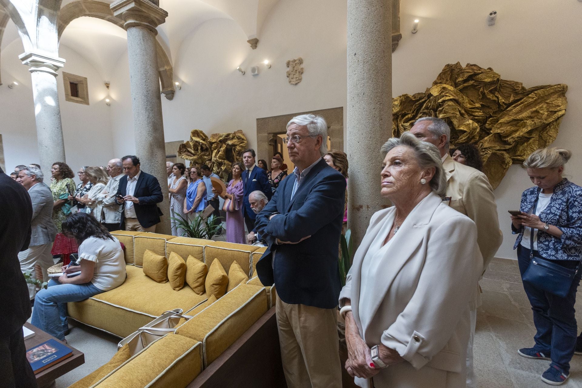 Asisitentes mientras escuchaban las intervenciones. 