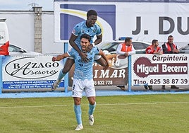 Jacobo y Dawda celebran un tanto frente a Las Palmas Atlético.