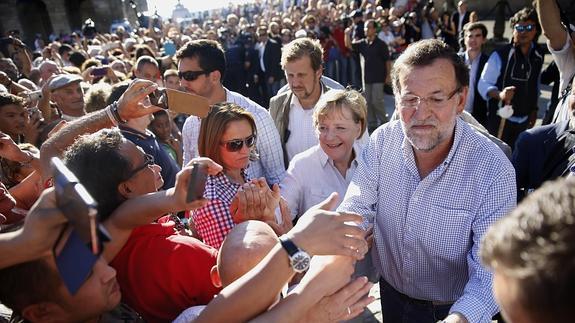 Rajoy y Merkel, en Santiago.