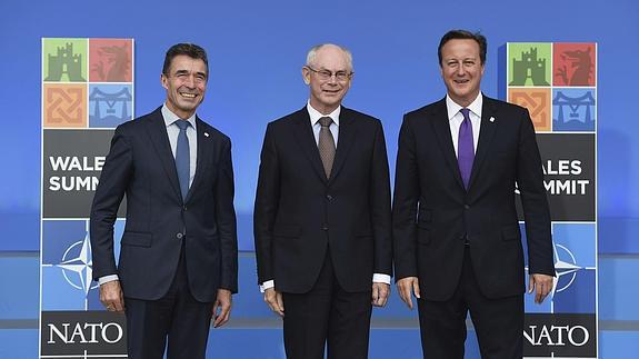 Rasmussen, Van Rompuy y Cameron.