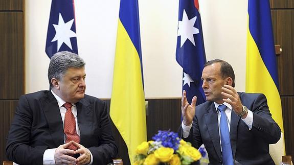 El presidente ucraniano, Petro Poroshenko, el primer ministro australiano Tony Abbott. 