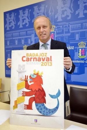 Miguel Ángel Rodríguez de la Calle muestra el cartel ganador. ::
J. V. A.