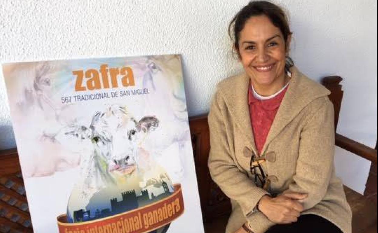 La concjela de Cultura y turismo junto al cartel de la FIG 2020 