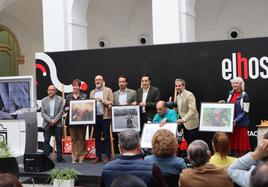 Los premiados con las fotografías ganadoras en el concurso