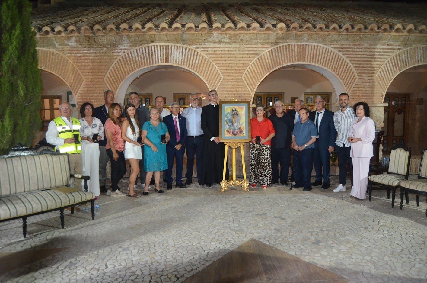 Los protagonistas de la velada en el Saliente, con el cartel de este año.