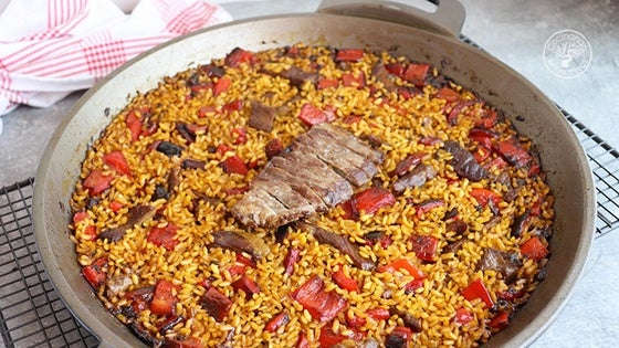 Arroz con presa ibérica y pimientos rojos