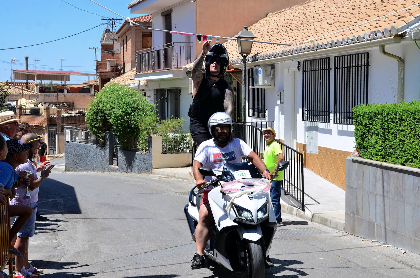 San Roque humedece el barrio de Caicena de Huétor Vega