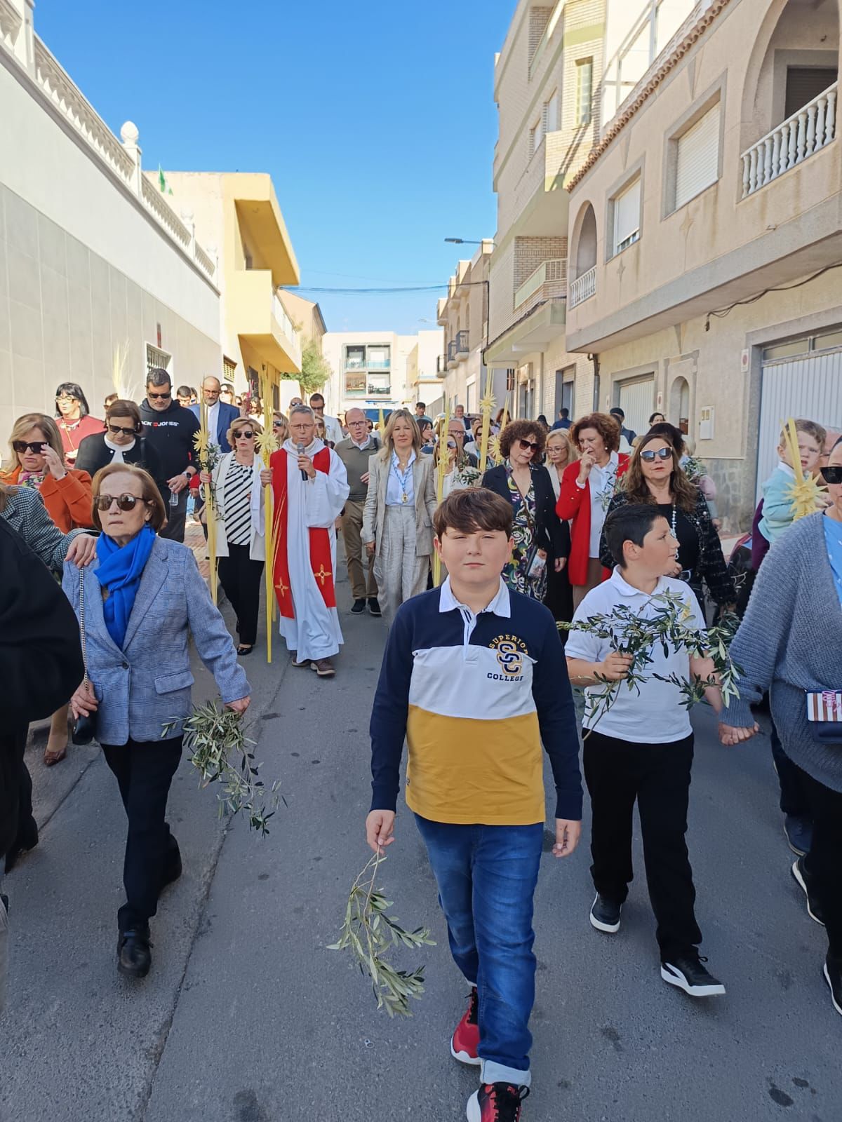 Roquetas ve pasar La Borriquita por sus calles
