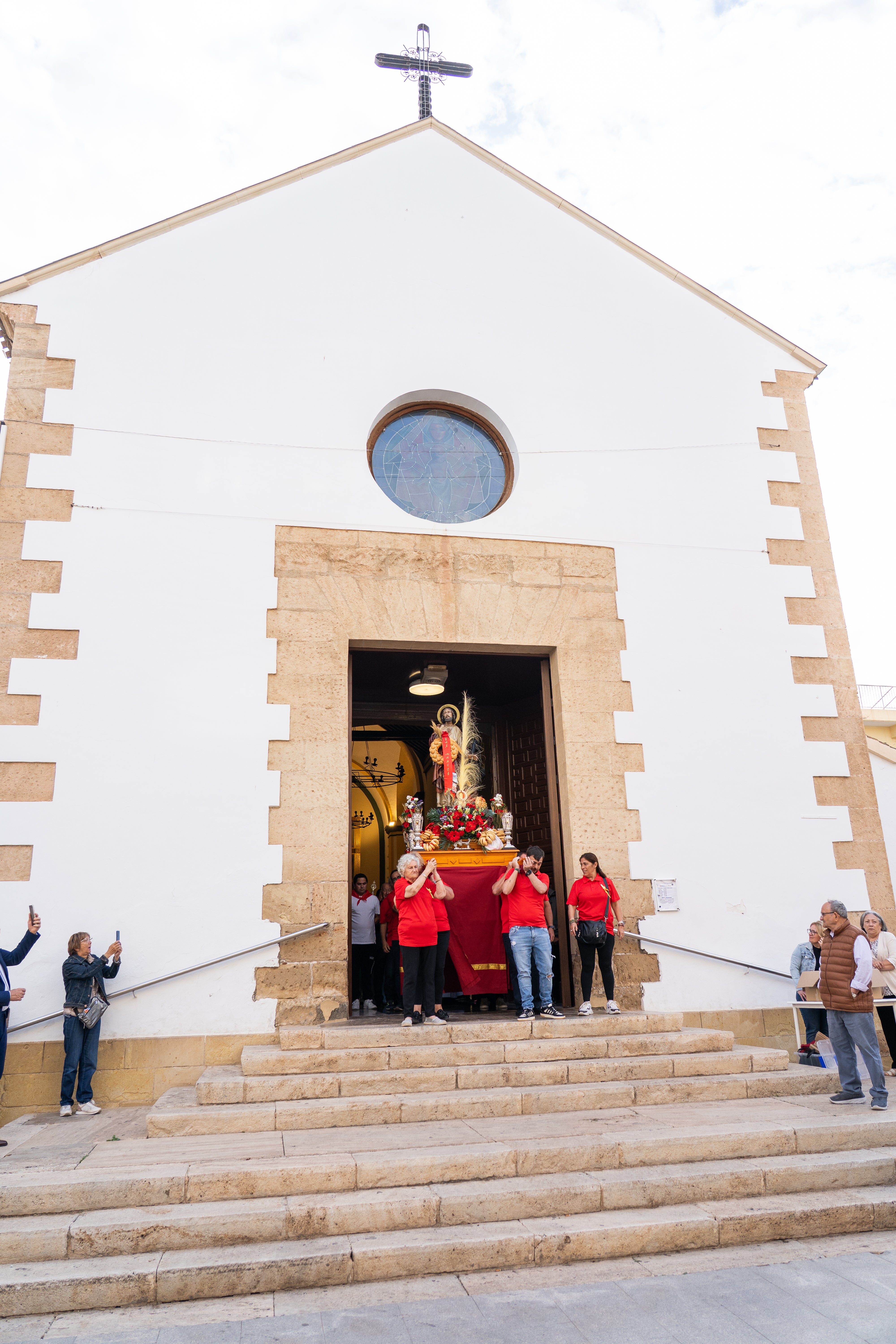 San Marcos recorre en procesión las principales calles de Roquetas, en imágenes