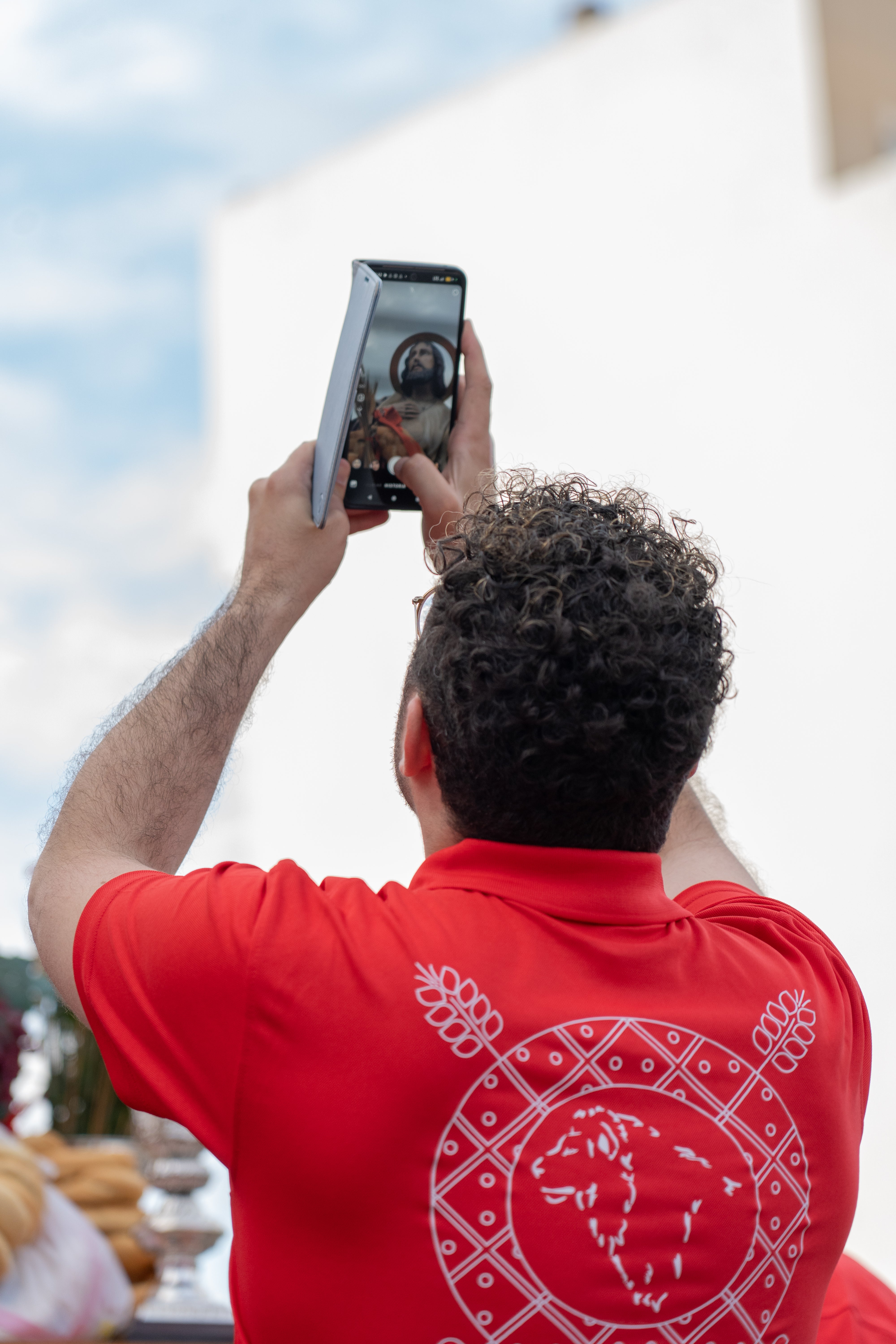 San Marcos recorre en procesión las principales calles de Roquetas, en imágenes
