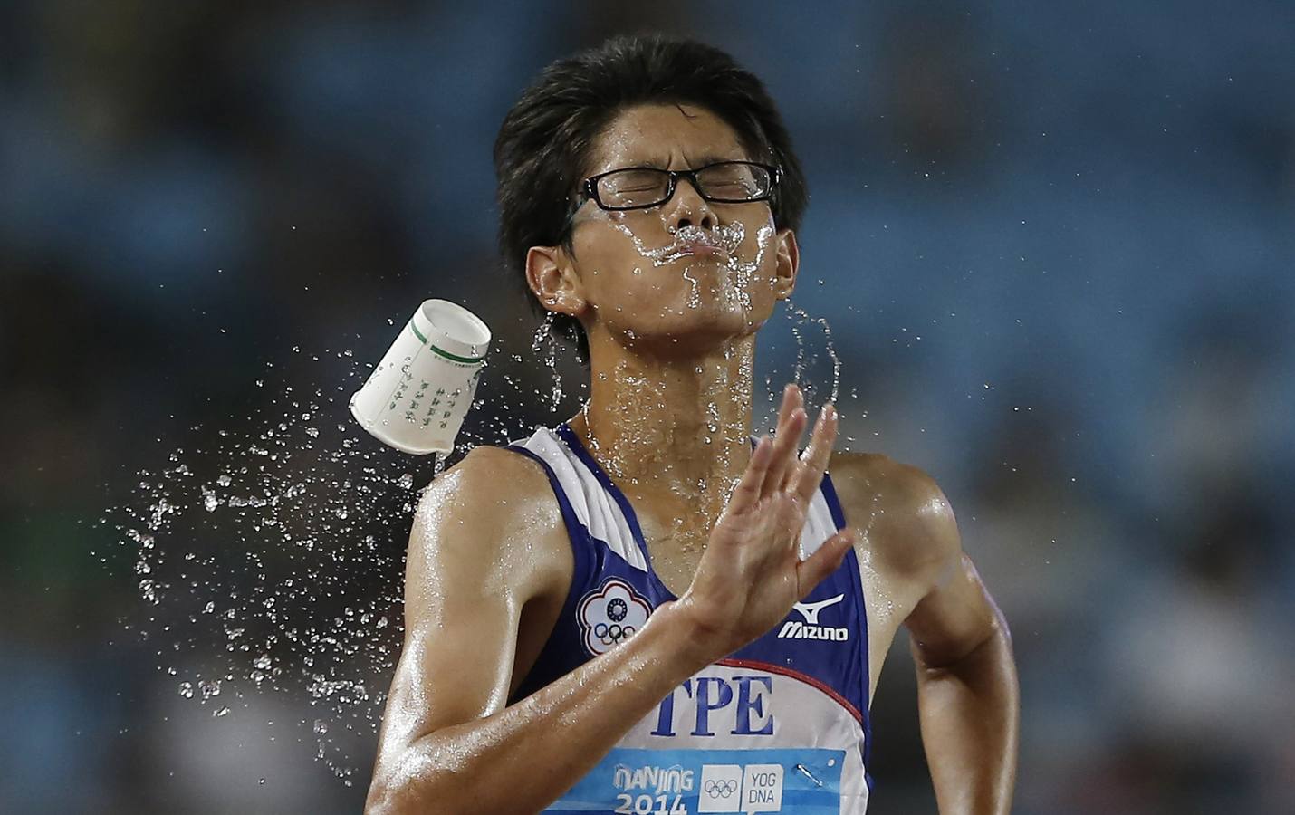 Carrera de 10.000 metros a pie en los Juegos Olímpicos de 2014 en Nanjing, provincia de Jiangsu.