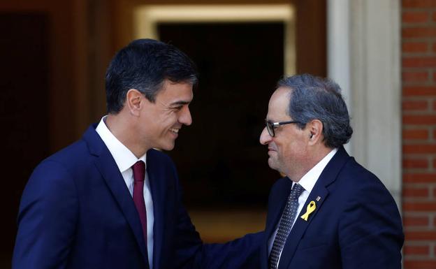 Pedro Sánchez y Quim Torra, durante una reunión en la Moncloa, en julio de 2018.