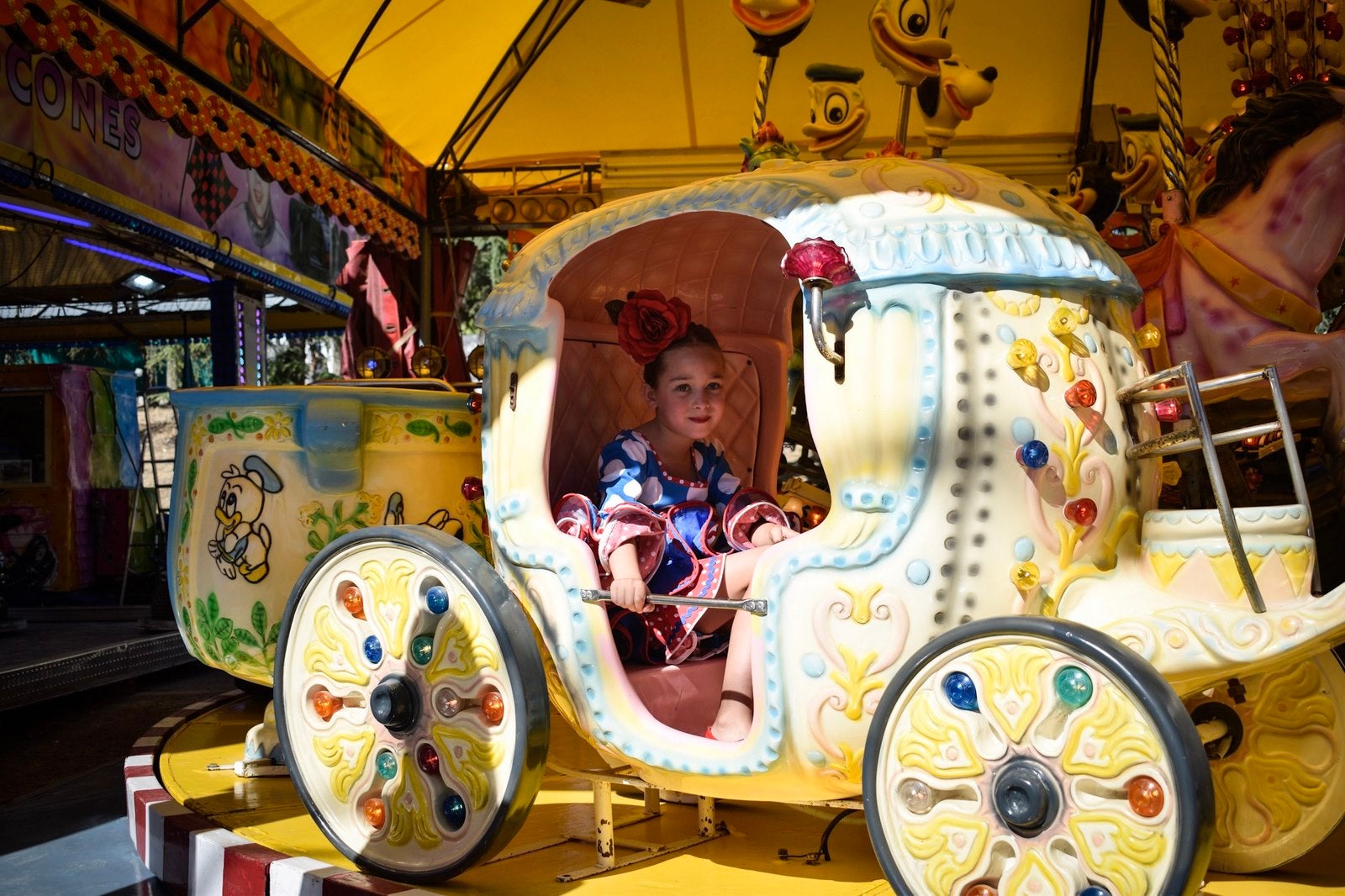 Fotos: Martes de columpios en el ferial