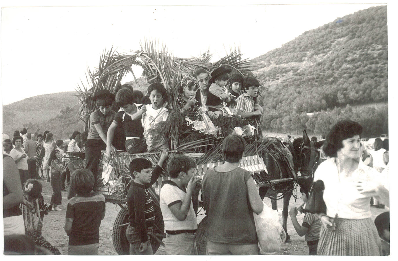 La romería de San Miguel es una tradición en la que se reafirma la identidad del Albaicín y abren el barrio al resto de la ciudad. Esta galería es una muestra gráfica del arraigo de esta fiesta tan granadina