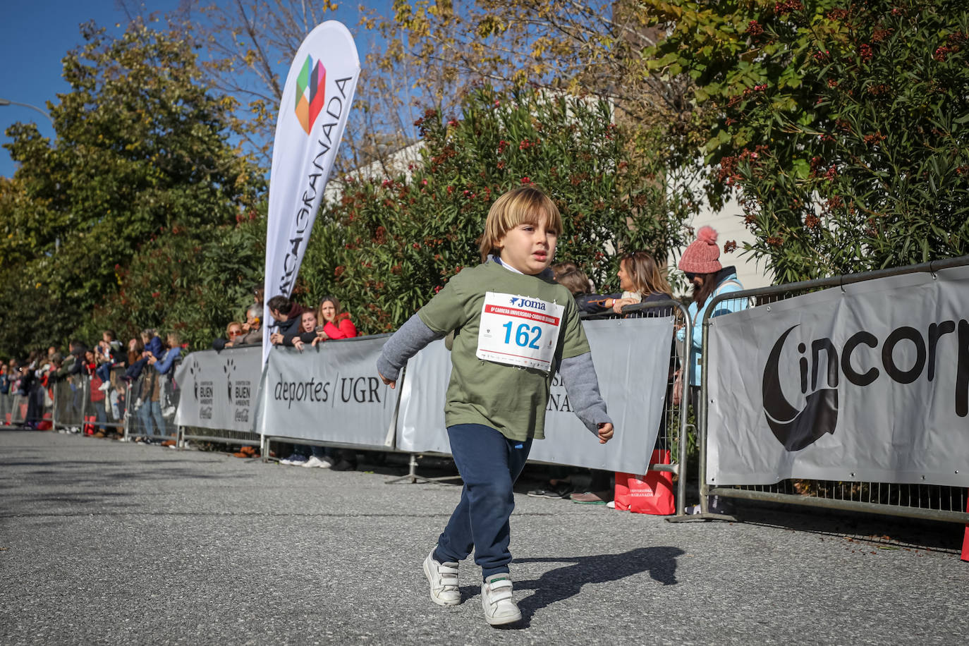 240 niños y niñas participan en la primera jornada de la sexta edición de la Carrera Universidad Ciudad de Granada