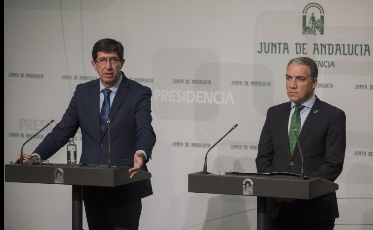 Juan Marín y Elías Bendodo. 