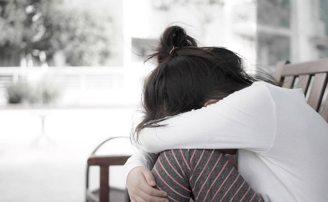 Una adolescente abatida. 