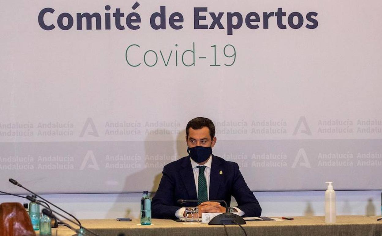 El presidente de la Junta, Juanma Moreno, en la última reunión del Consejo Asesor de Alertas de Salud Pública de Alto Impacto.