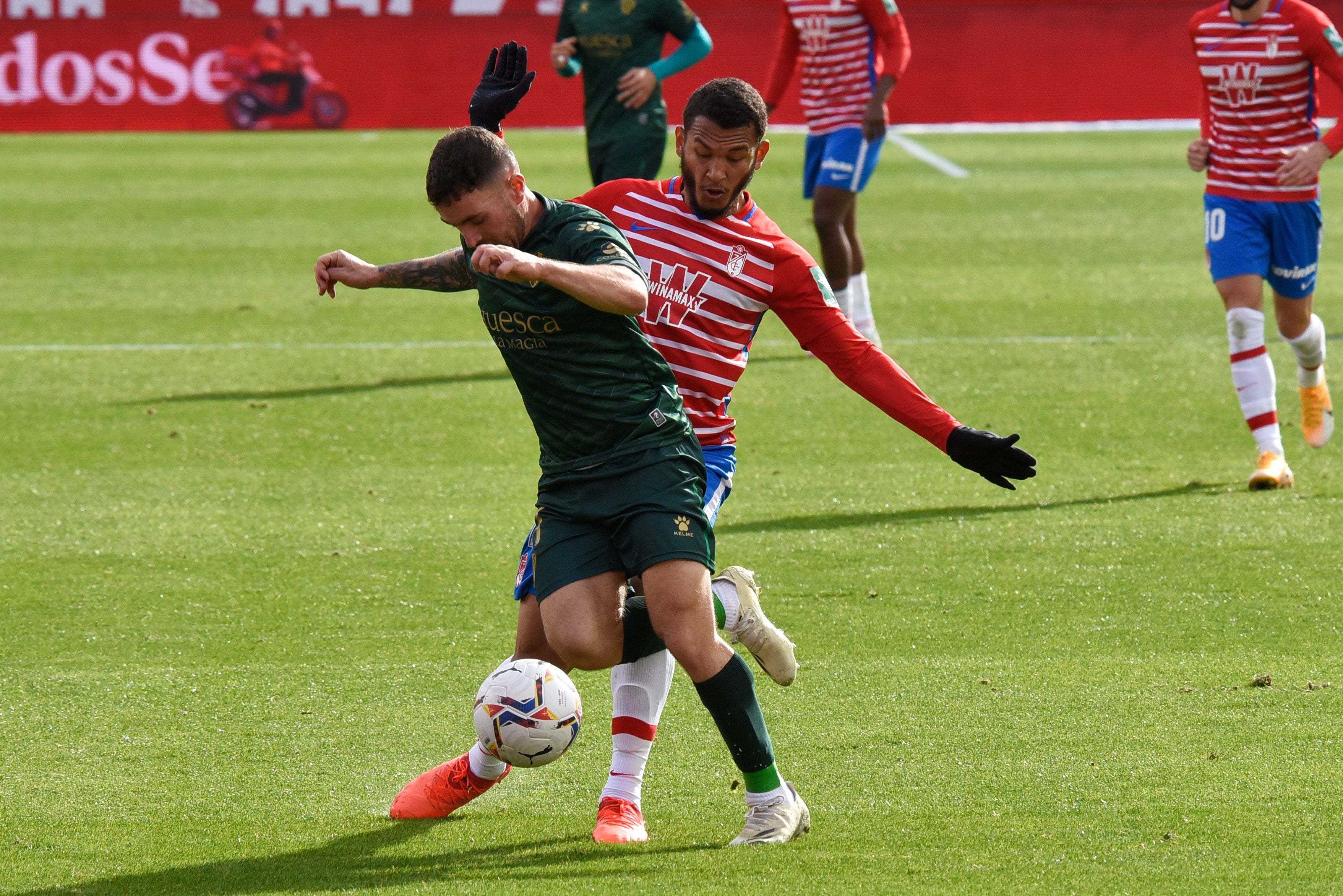 Repasa todas las imágenes del duelo entre rojiblancos y oscenses