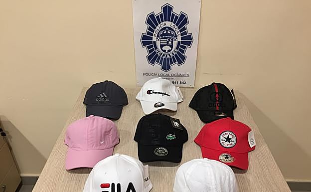 Intervienen más de 5.000 artículos falsificados en una nave de Ogíjares y detienen a una empresaria