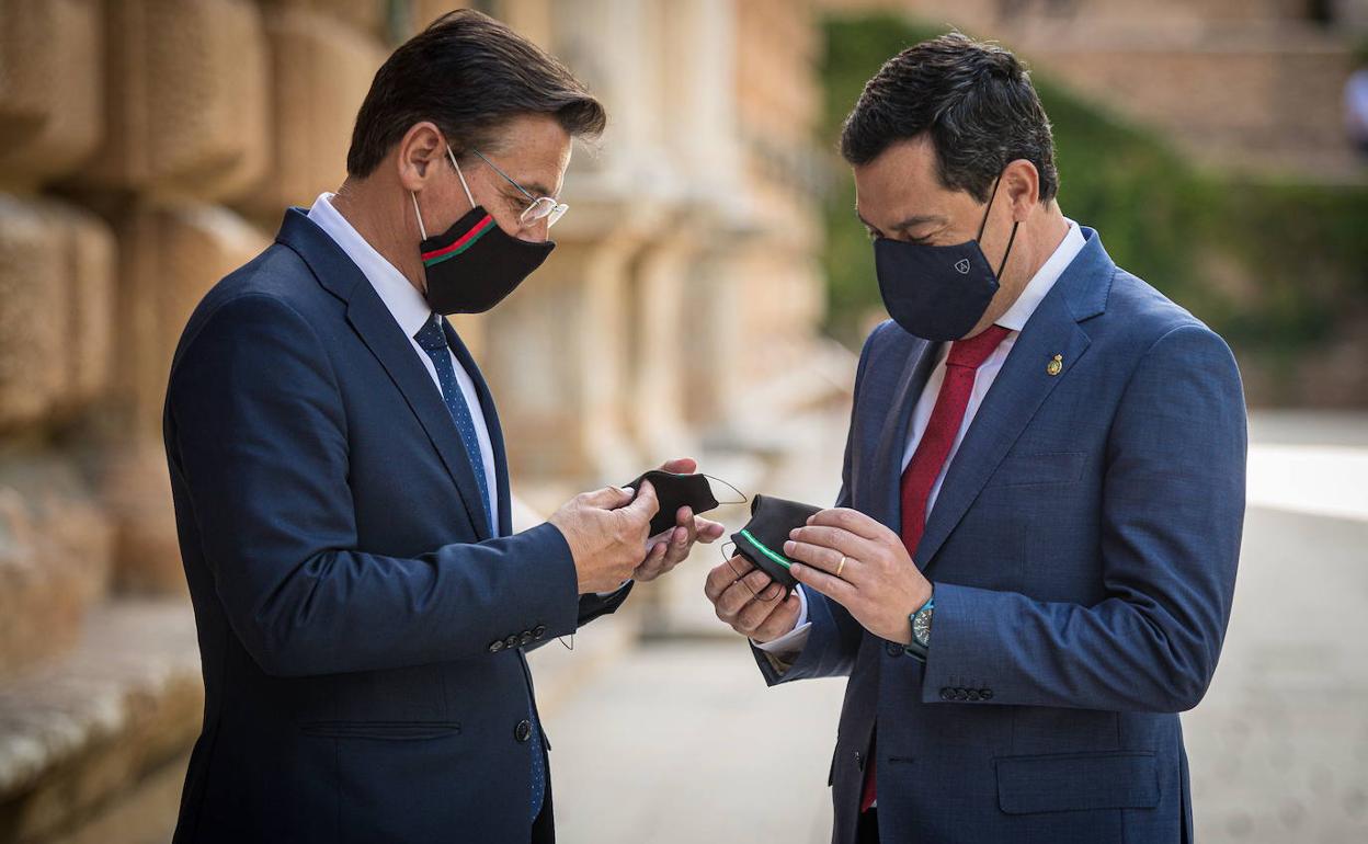 Juanma Moreno y Luis Salvador, el pasado mes de junio en Granada. 