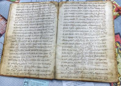 Imagen secundaria 1 - Iglesia (1) | Libro donde se describe el milagro (2) | Virgen de la Tizná (3)