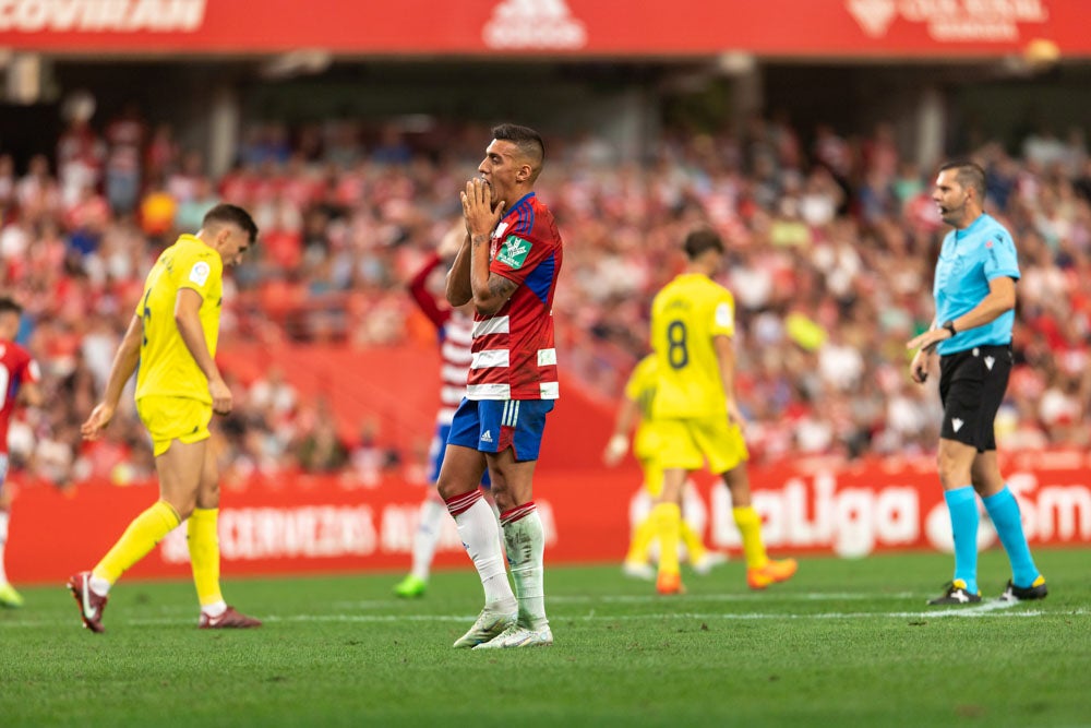 Repasa en fotos los mejores momentos del partido disputado este lunes en Los Cármenes