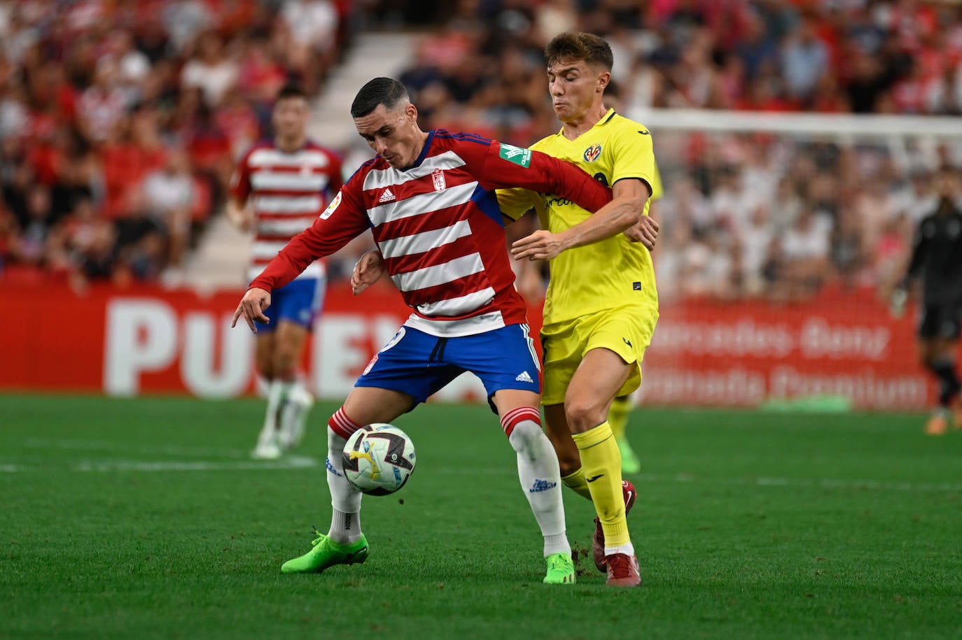 Repasa en fotos los mejores momentos del partido disputado este lunes en Los Cármenes