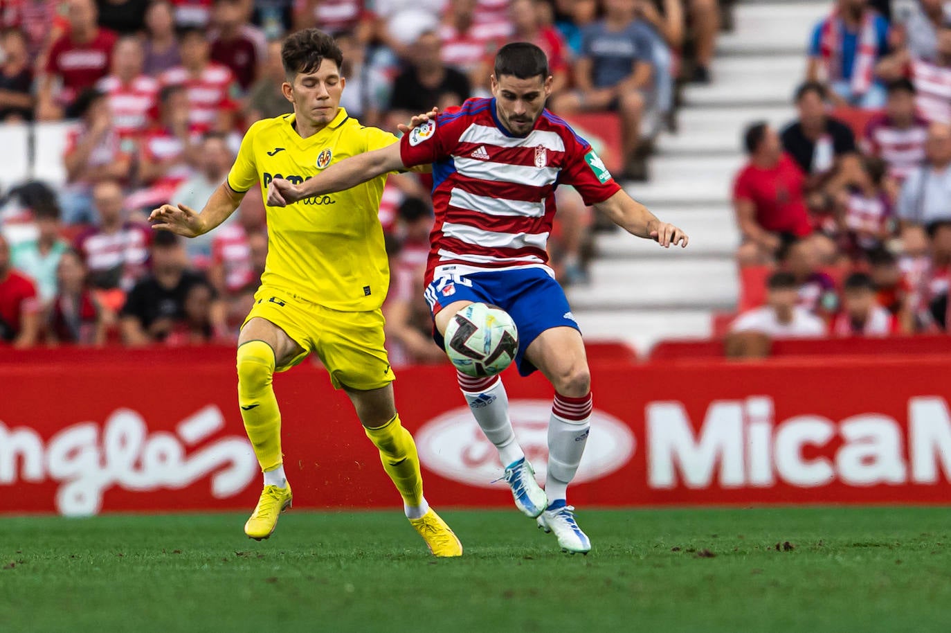 Repasa en fotos los mejores momentos del partido disputado este lunes en Los Cármenes