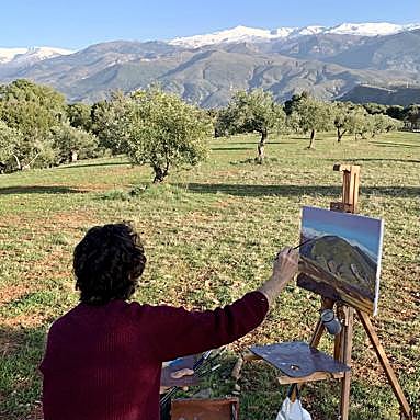 Francisco Carreño pinta del natural la Sierra. 