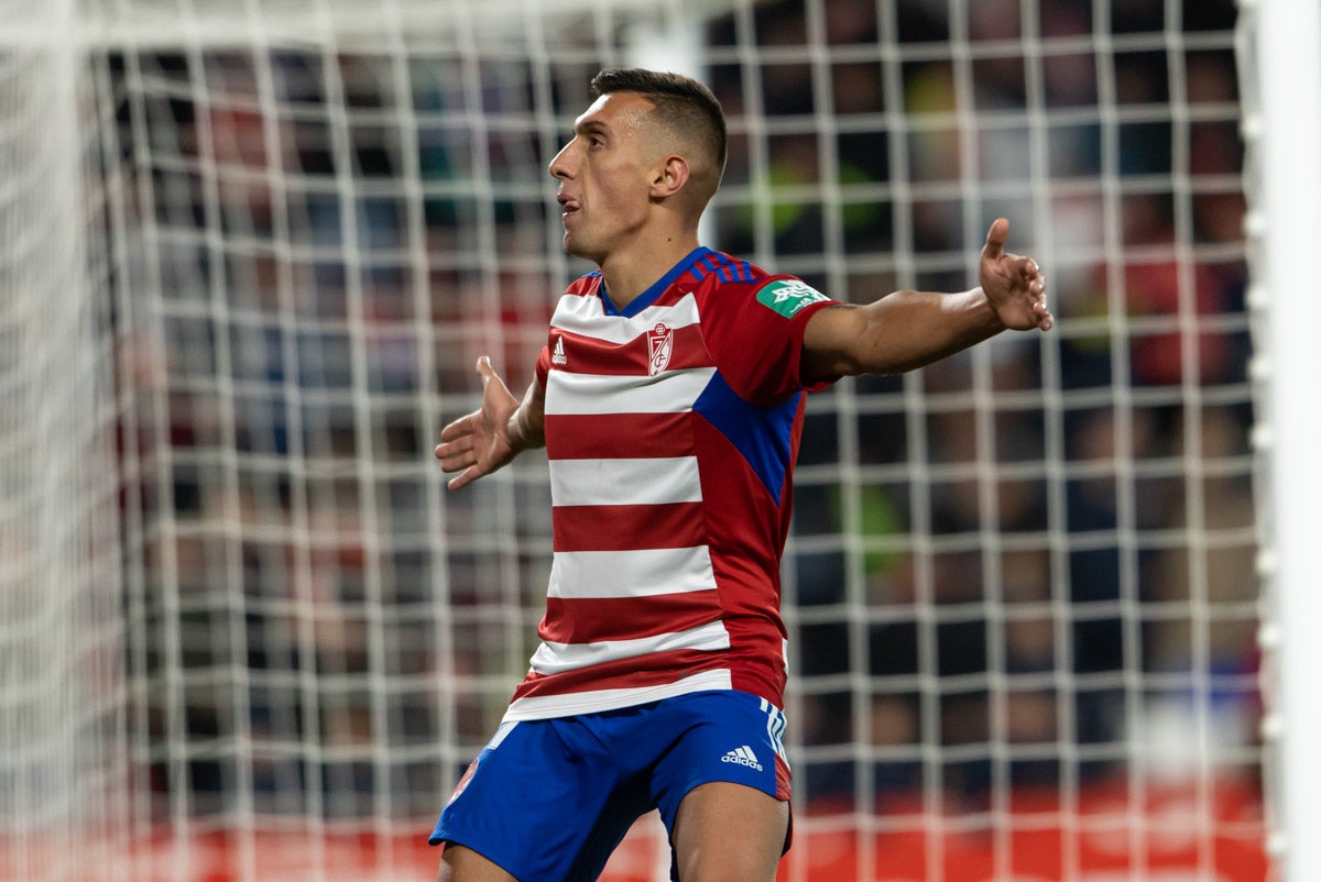 Las mejores imágenes del partido disputado este viernes en Los Cármenes