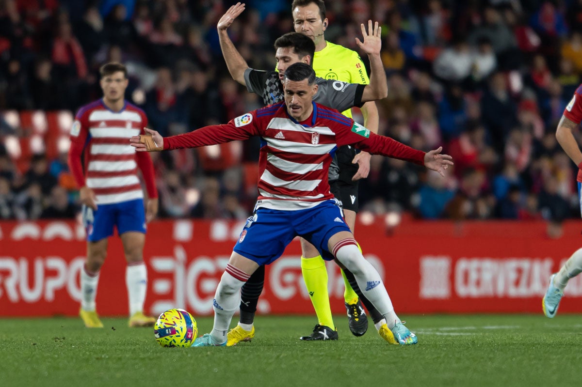 Las mejores imágenes del partido disputado este viernes en Los Cármenes