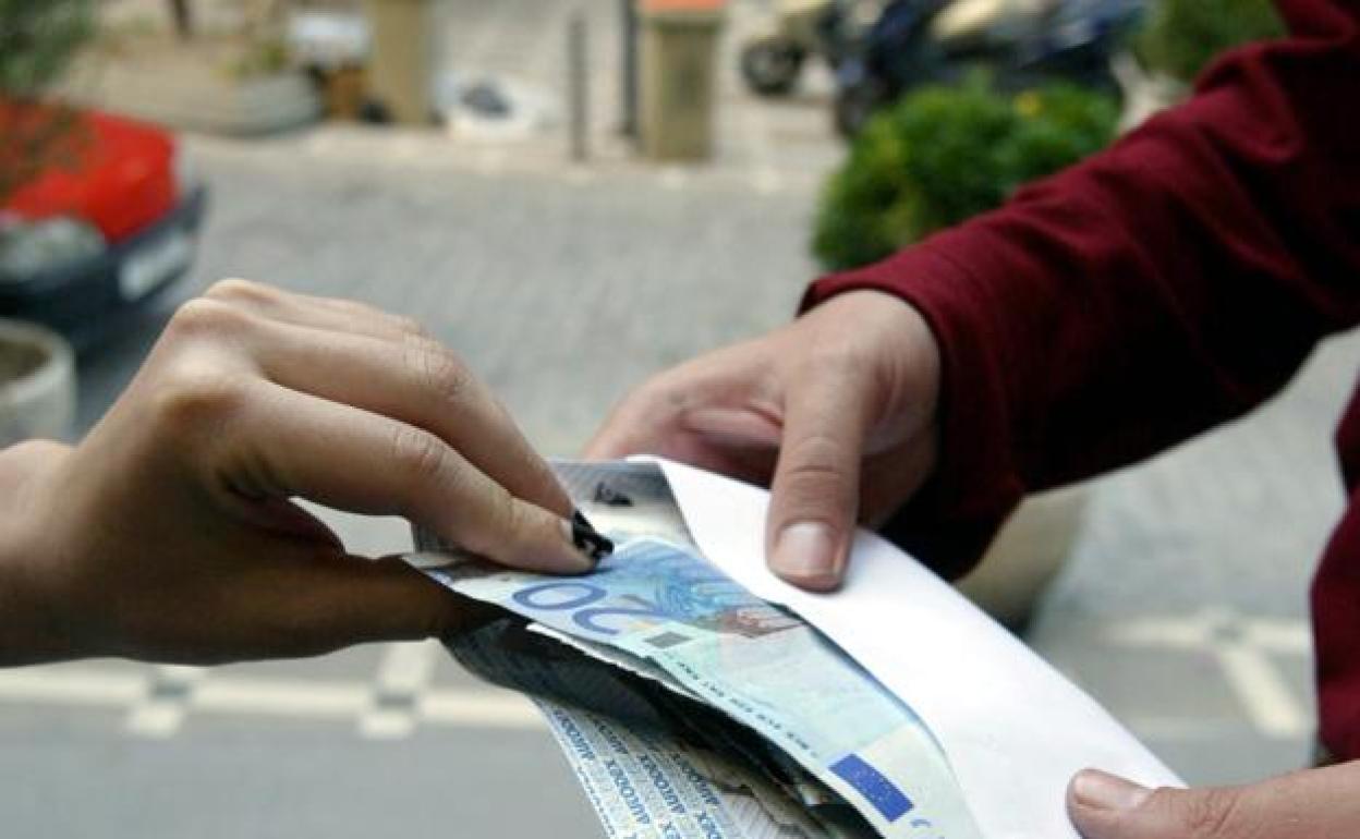 Así funciona el 'timo del scam': cómo evitarlo con la Lotería de Navidad.