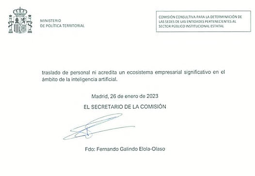 Firma y fecha en el documento.