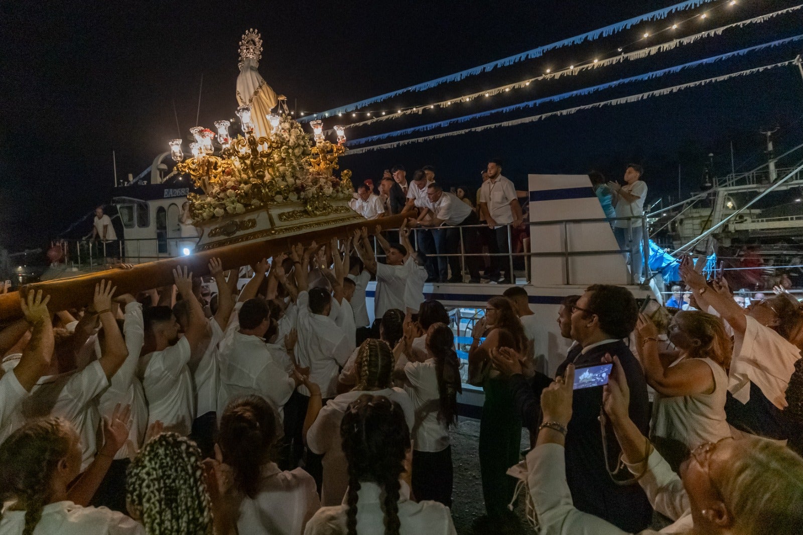 Espectaculares imágenes de la procesión de la Virgen del Carmen en Motril