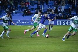 Lance del partido disputado en Linarejos entre Linares y Elche.