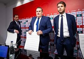 Amado, Sandoval y Tognozi, en la presentación del técnico.