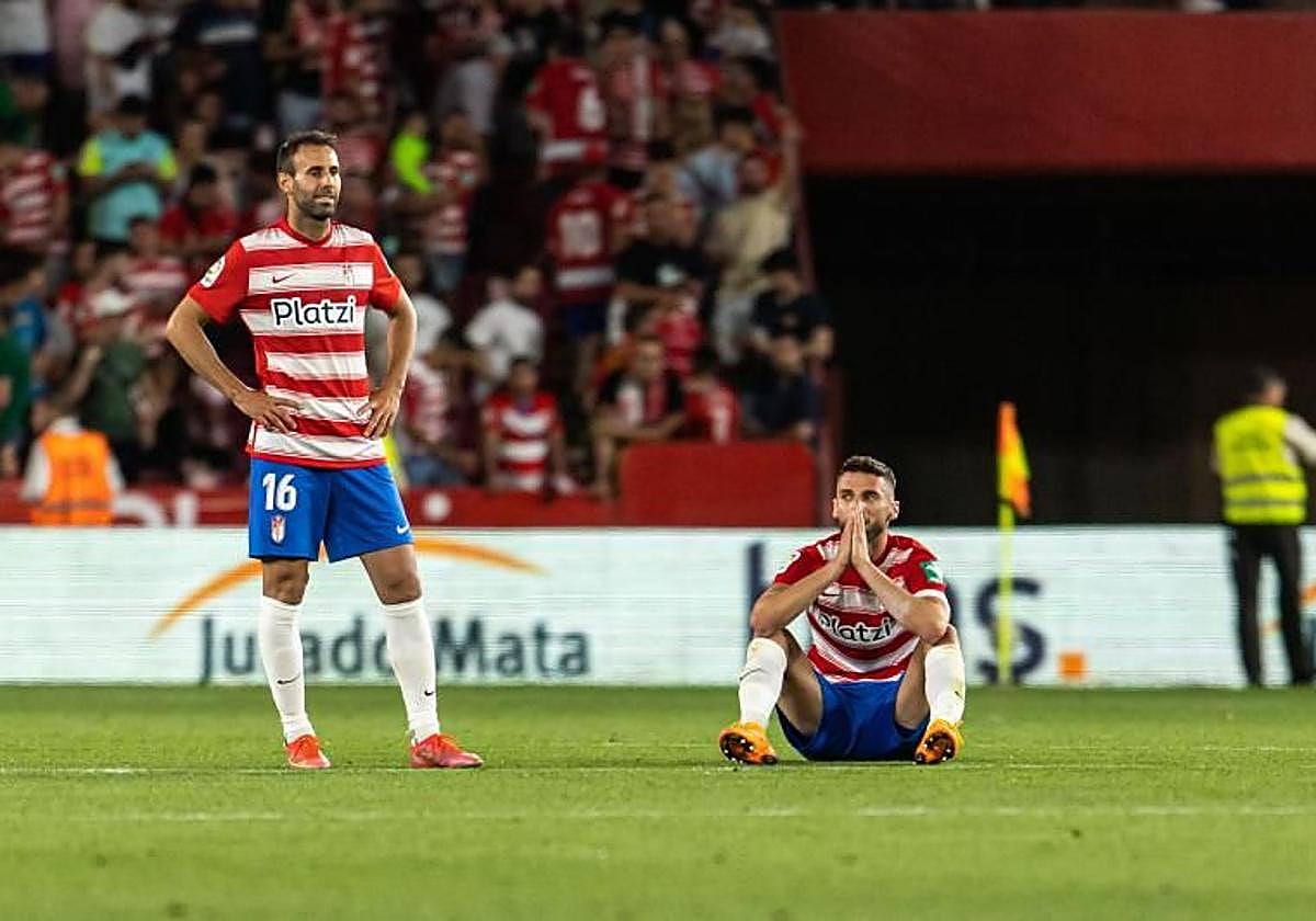 Víctor Díaz y Domingos Duarte, tras el anterior descenso.