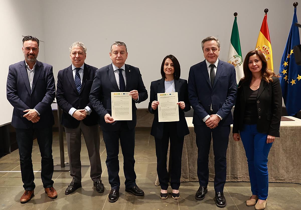 Miembros de la Escuela de Organización Industrial y la Junta de Andalucía.