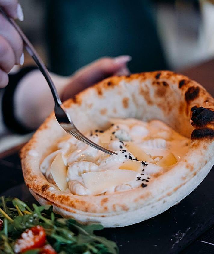 Imagen secundaria 2 - Esta pizzería de Granada arrasa en reseñas de Google: «Queremos ir a otras provincias»