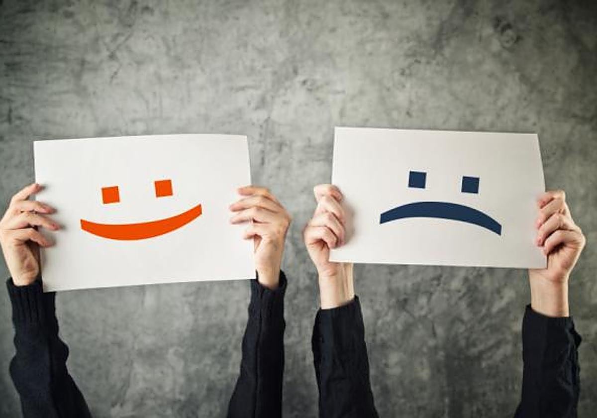 Carteles con cara triste y sonriendo