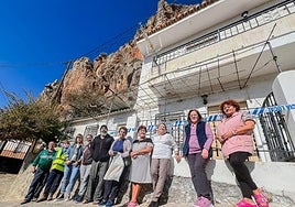 Vecinos afectados por la ladera