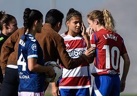 Laura Pérez y Lauri, en un partido anterior.