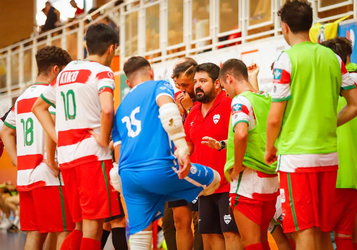 Jugadores y entrenador del Sima Granada.