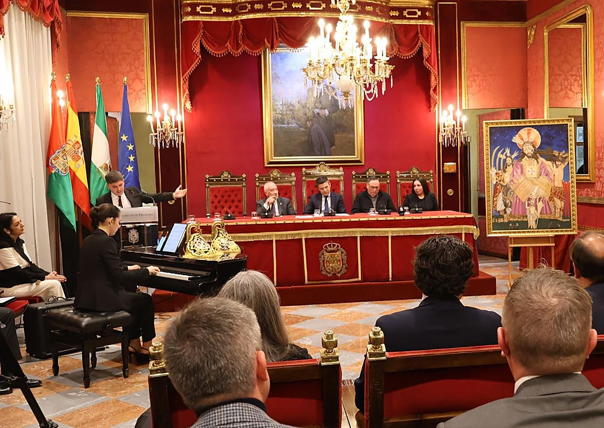 Imagen secundaria 1 - Momentos de la presentación del cartel.