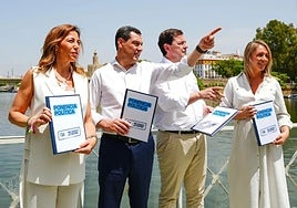 Natalia Chueca, Juanma Moreno, Alfonso Fernández Mañueco y Alma Ezcurra, este martes en Sevilla.