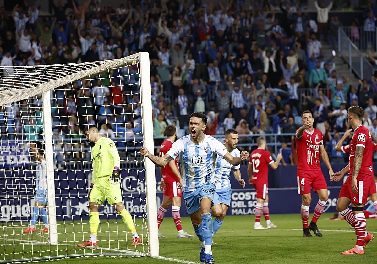 Nelson Monte celebrando un gol con el Málaga