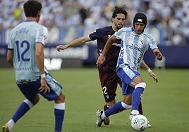 Un lance del duelo entre el Málaga y el Eibar en La Rosaleda.