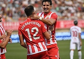 Álex Muñoz celebrando el gol con Baptistao