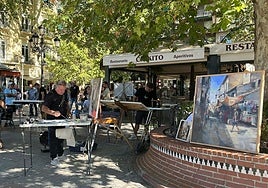 Juan Lucena, a la izquierda, y el cuadro en el que me colé.